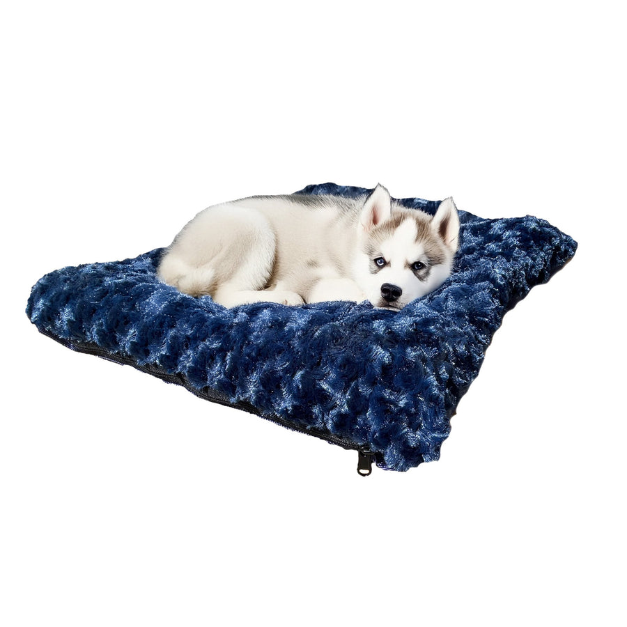 White dog resting on a midnight blue Cloud Furvana rectangle dog bed