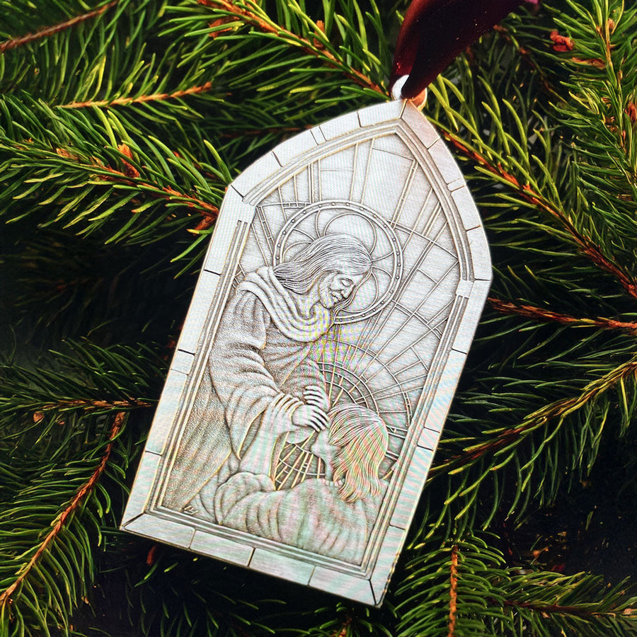 Styled display featuring Miracles Cathedral Window Ornament