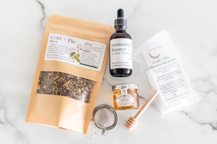Winter botanical gift set with tea, tincture, honey and body-care items