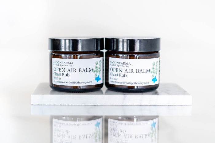 Two jars of Open Air menthol chest balm