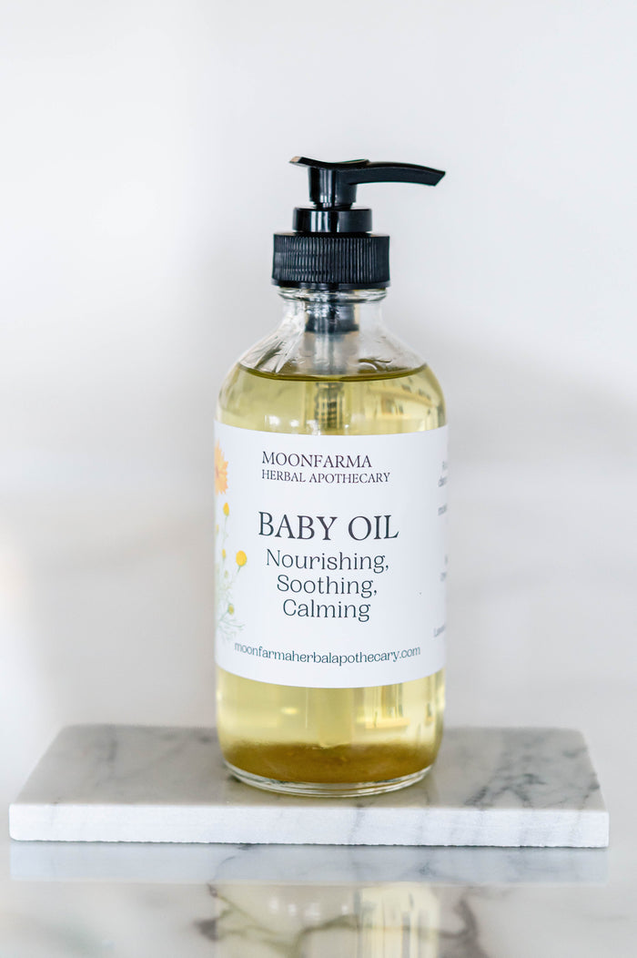 Pump bottle of apricot kernel botanical baby oil
