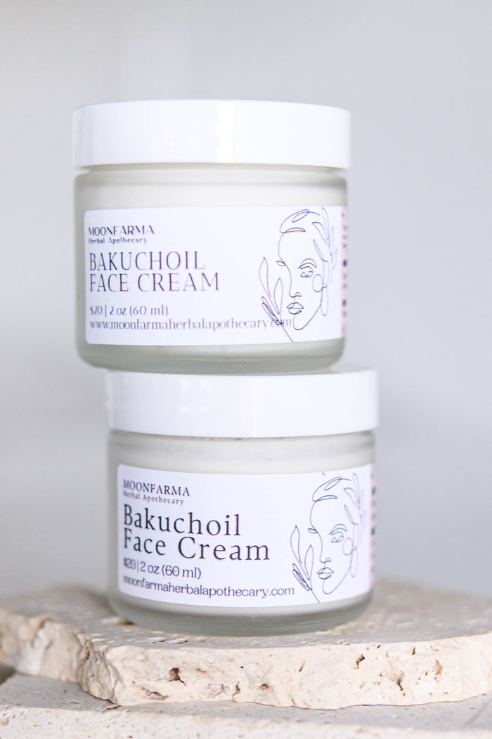 Stacked jars of bakuchiol face cream