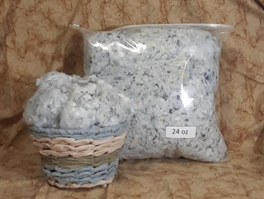 Recycled Fiber & Foam Mix Stuffing, packaged craft filling beside loose stuffing in a display basket