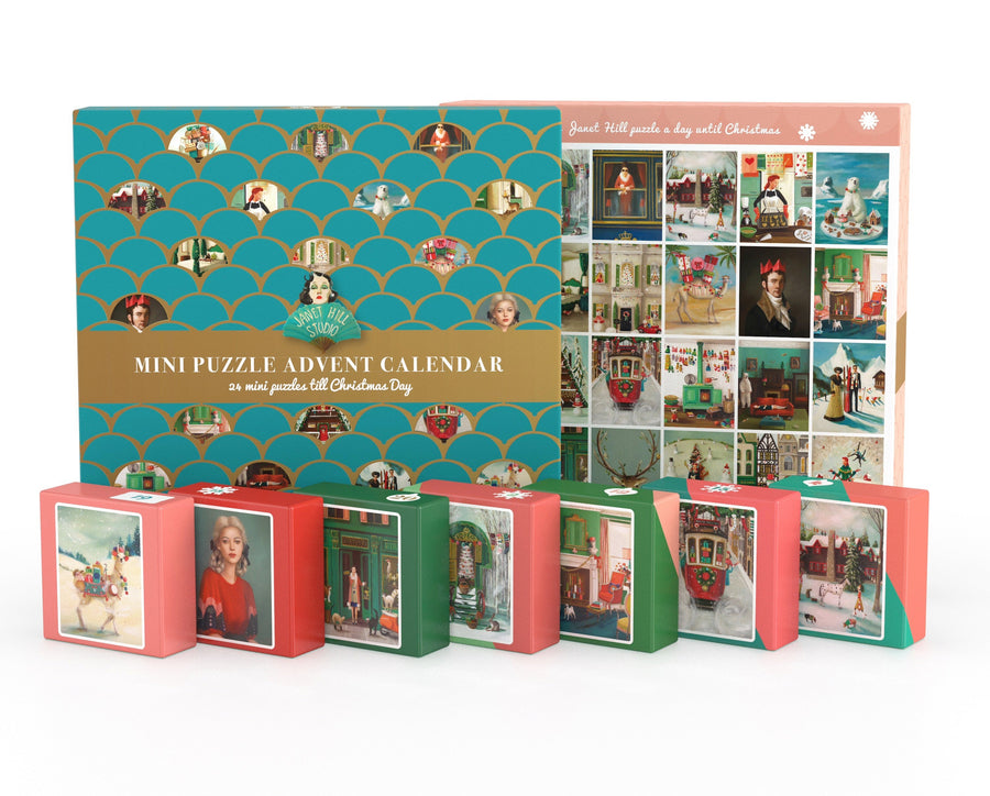 Collection of Janet Hill advent calendar mini puzzle boxes