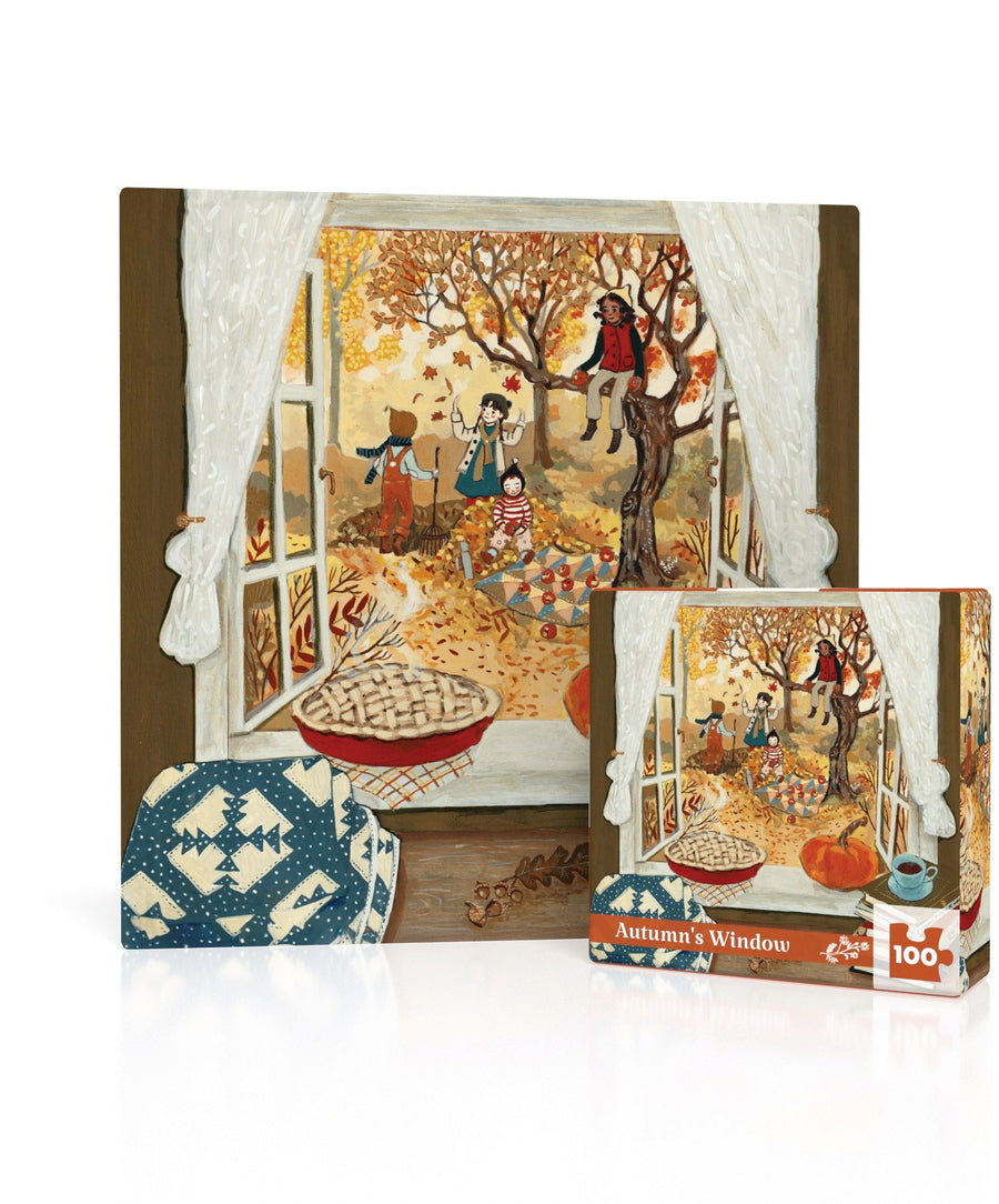 Autumn’s Window Mini puzzle artwork beside its box