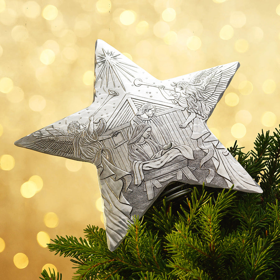 Styled display featuring Holy Family Star Tree Topper
