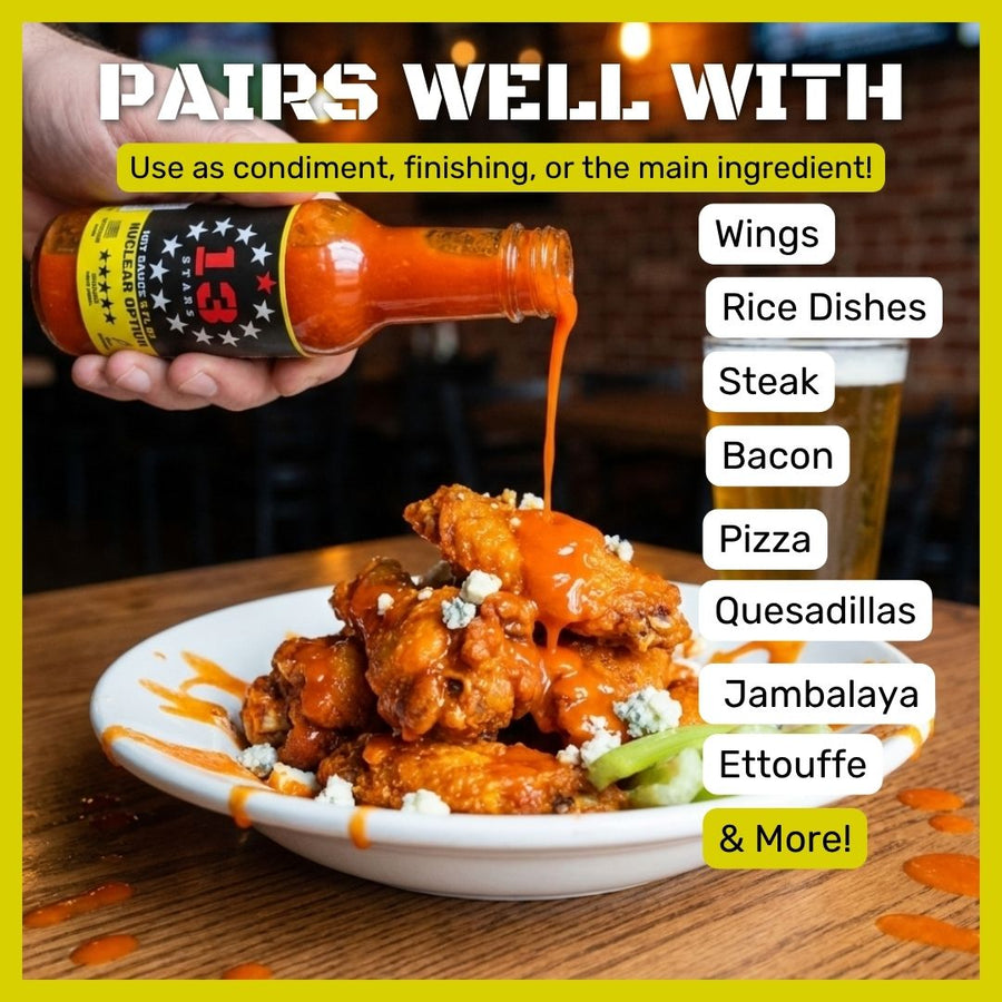 Nuclear Option hot sauce poured onto wings with suggested food pairings