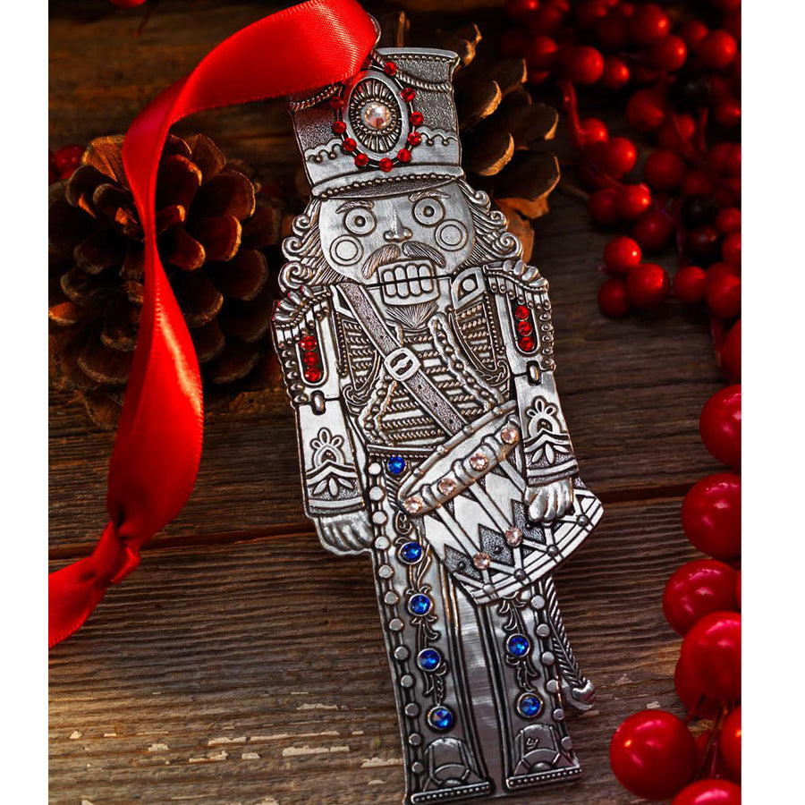 Styled display featuring The Nutcracker Prince Drummer Ornament