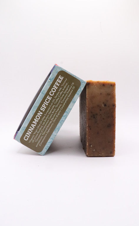 Spiced coffee soap bar beside its Cinnamon Spice Coffee ingredient label