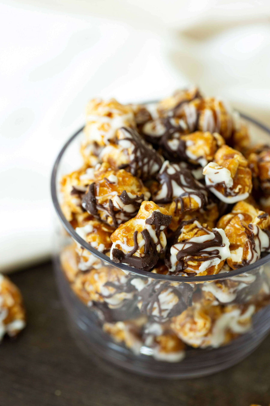 Chocolate Drizzle Caramel Popcorn — product and serving view