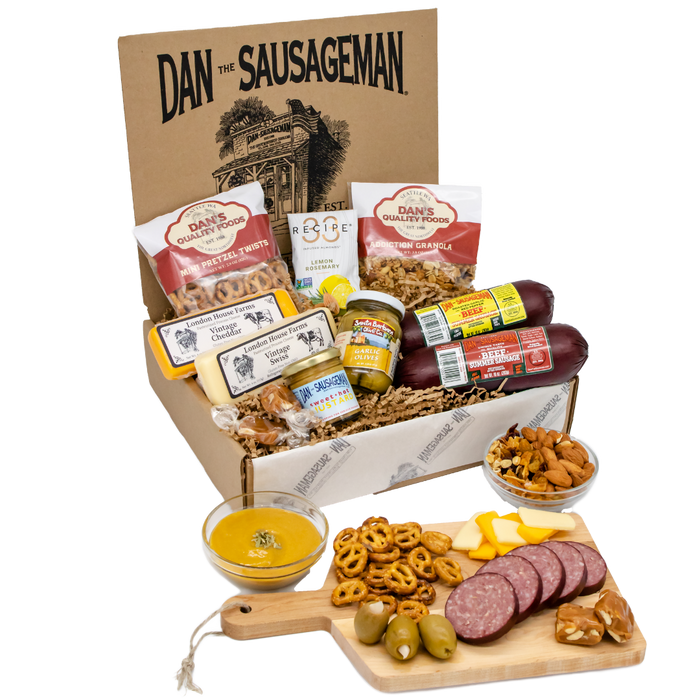 Orca gift box with sausage, cheeses, granola, olives, pretzels, mustard, nuts and candy; board not included