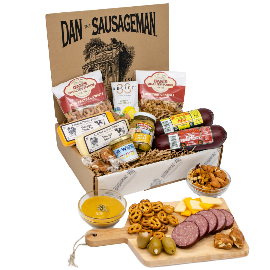 Orca gift box with sausage, cheeses, granola, olives, pretzels, mustard, nuts and candy; board not included