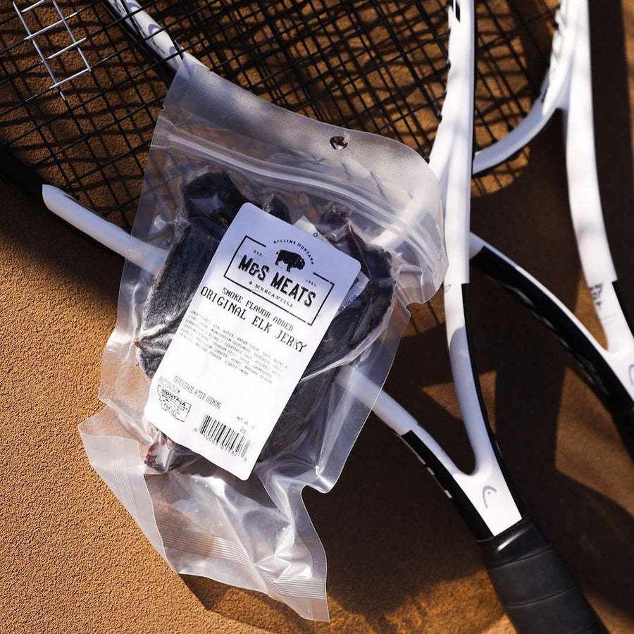 Original Elk Jerky, package resting on a chair