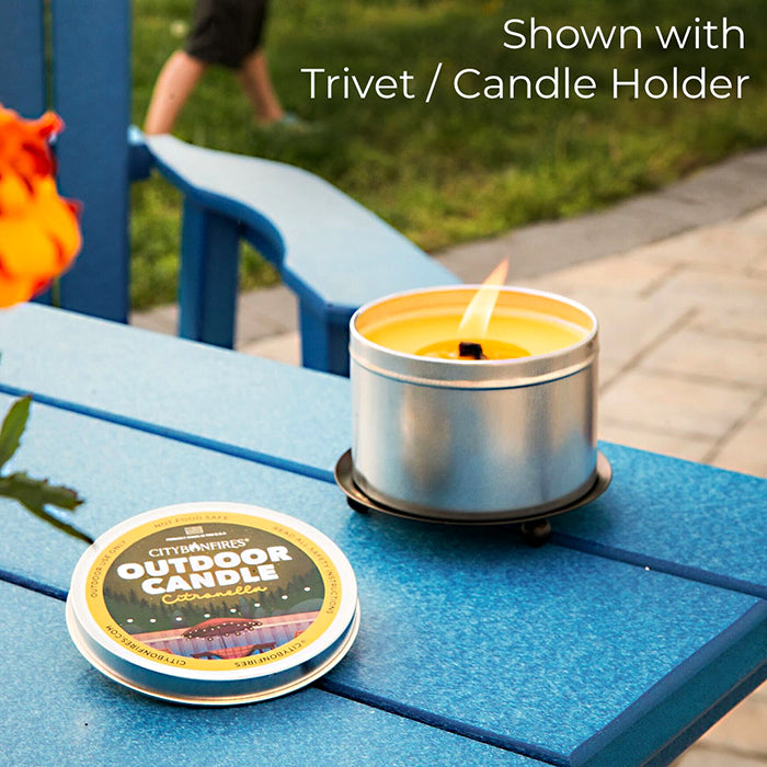 Outdoor candle on a separate black trivet