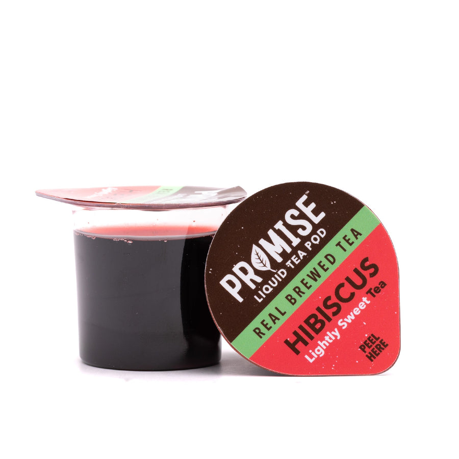 Open hibiscus tea pod beside its lid