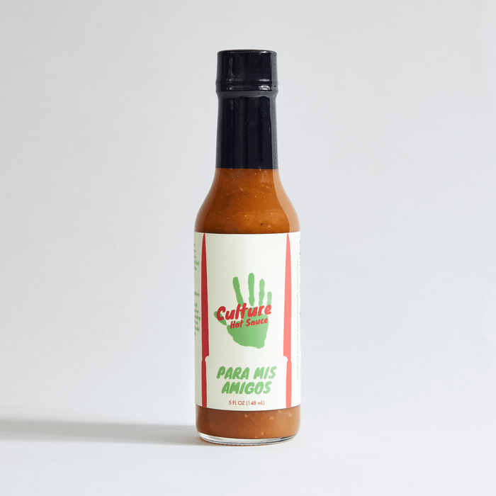 Para Mis Amigos tomato and chili hot sauce bottle with a green label