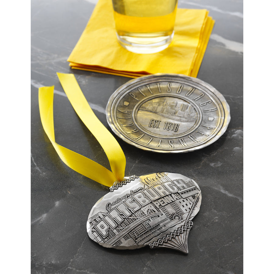 Collection display featuring Greetings from Pittsburgh Ornament