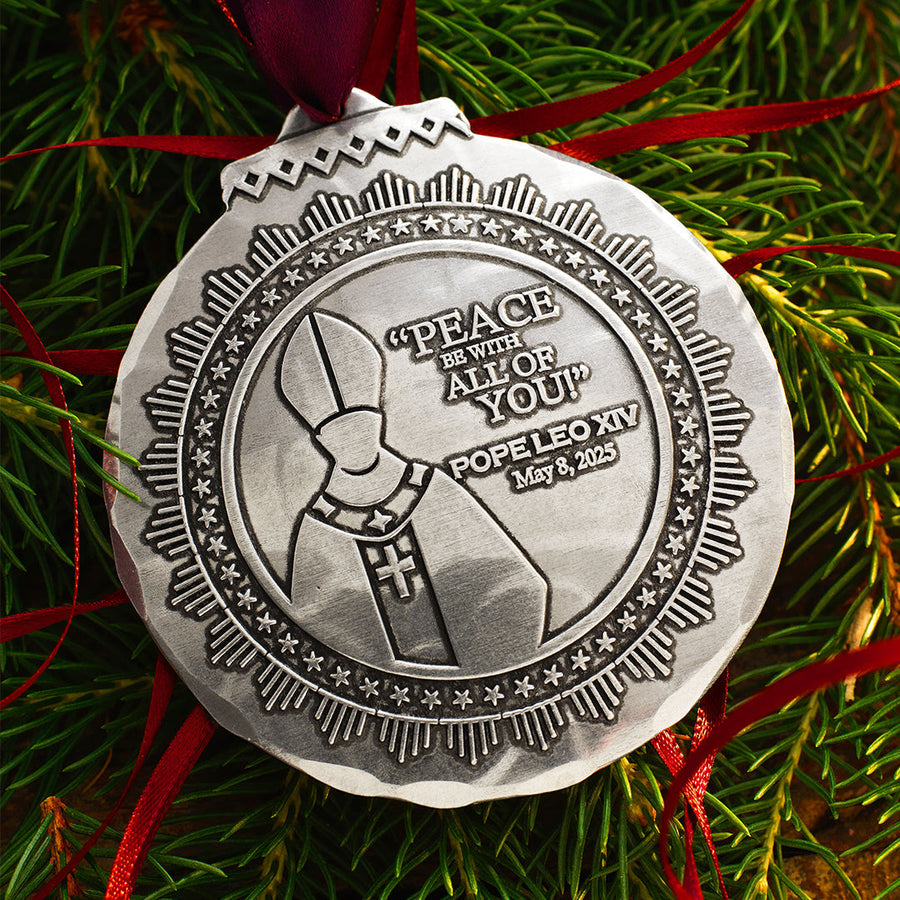 Styled display featuring Pope Leo Ornament