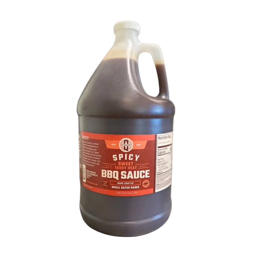 Spicy barbecue sauce in a large handled gallon jug