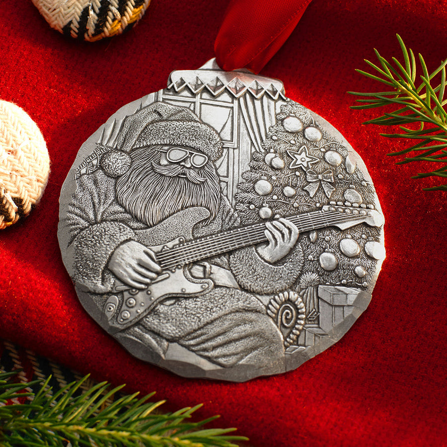 Styled display featuring Rock-N-Roll Santa Ornament