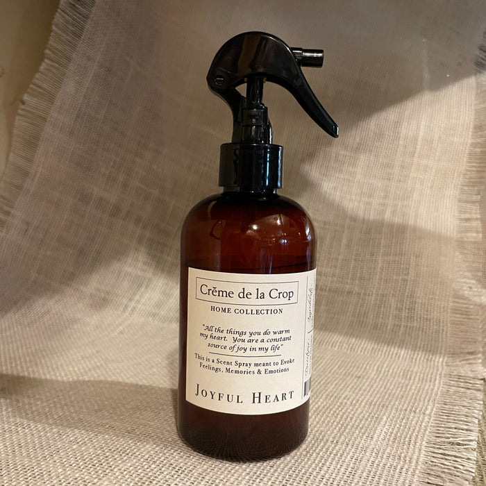 Joyful Heart Essential Oil Room Spray, 8 oz in an amber trigger-spray bottle