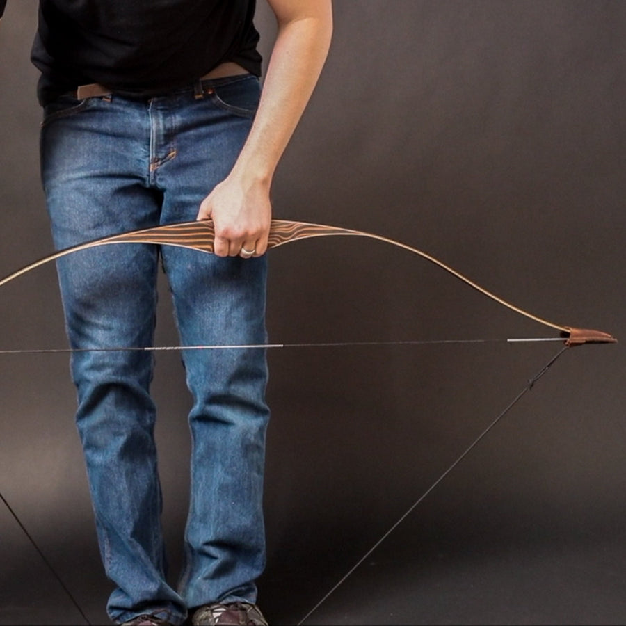 Leather Bow Stringer for Recurve Bows & Longbows — archer using bow stringer