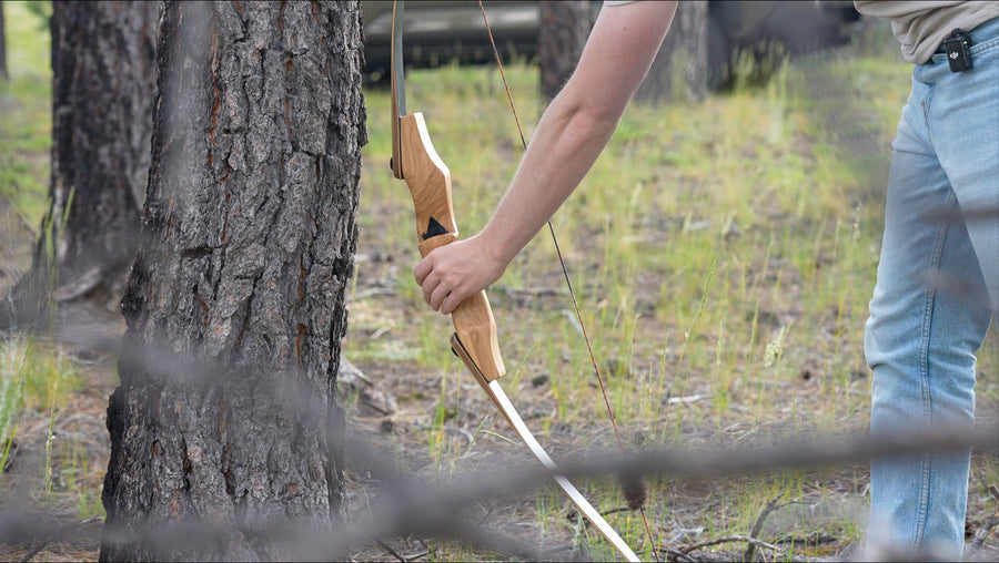 Bob Garner USA-Made Takedown Recurve Bow — archer with Bob Garner bow outdoors