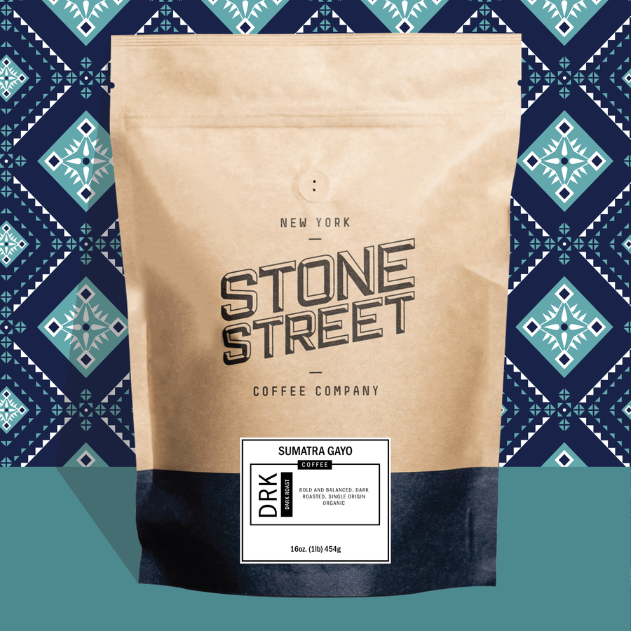 Sumatra Gayo coffee bag pictured against a colorful patterned background