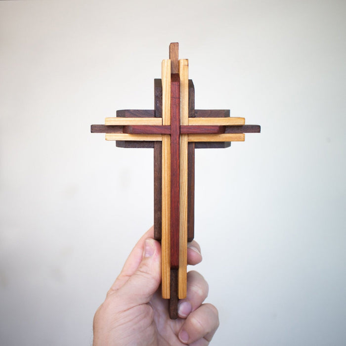 Small layered wood cross with contrasting hardwood colors.