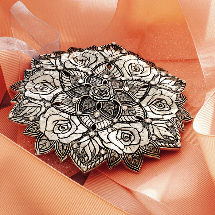 Styled display featuring Snow Crystal Rose Ornament