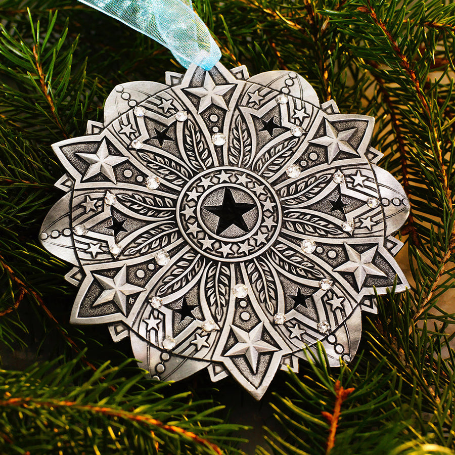 Styled display featuring Star Spangled Snow Crystal 2026 Ornament