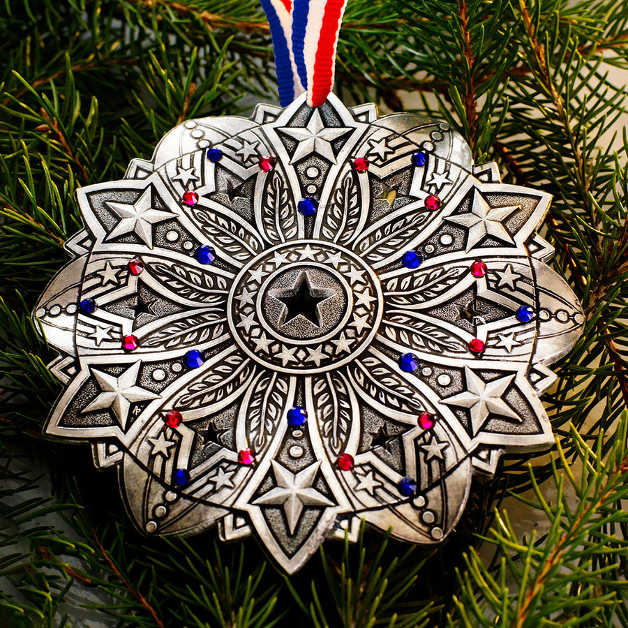 Styled display featuring Star Spangled Snow Crystal 2026 Ornament (America250)