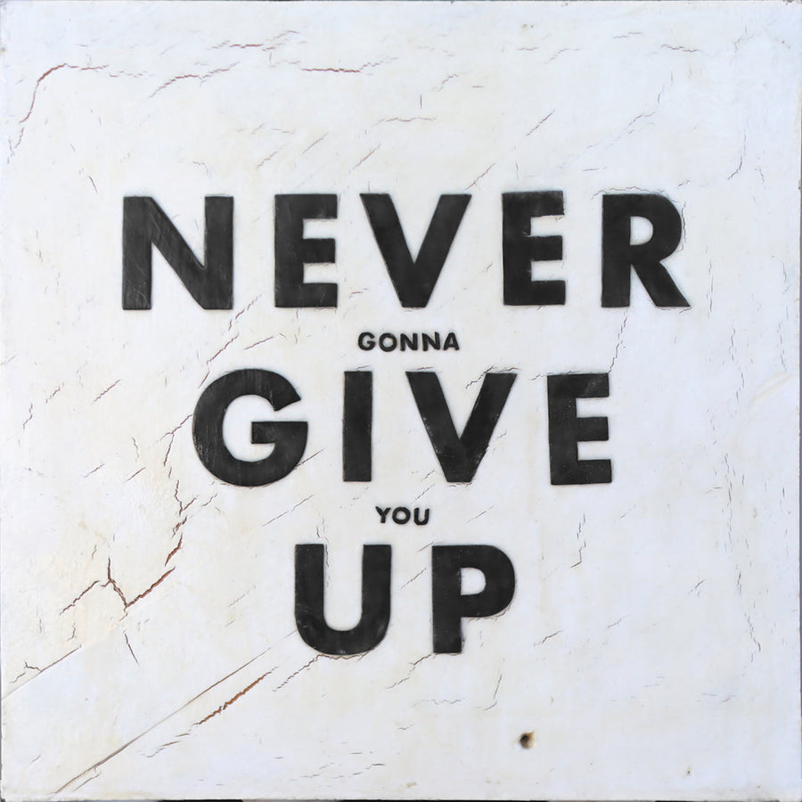 Never Give Up art print with bold distressed black lettering.