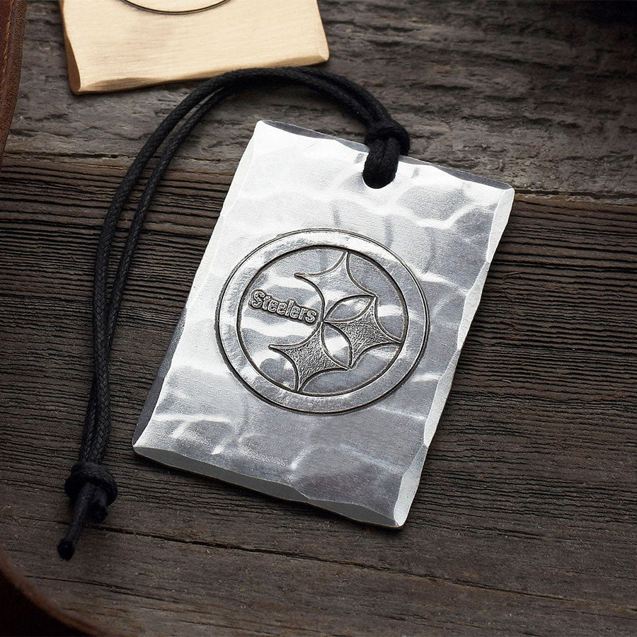 Styled display featuring Pittsburgh Steelers Logo Bag Tag
