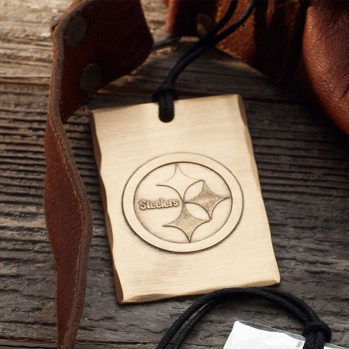 Styled display featuring Pittsburgh Steelers Logo Bag Tag