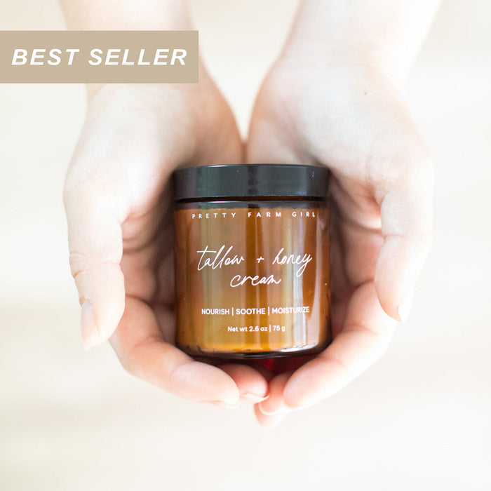 Hands holding Tallow and Honey cream jar