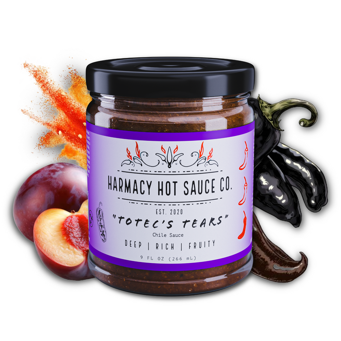 Totec's Tears pasilla and plum sauce jar with plums and peppers