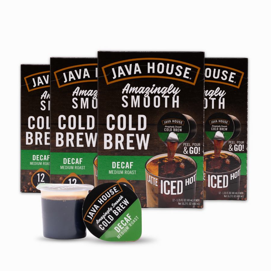 Decaf coffee cartons beside an open pod