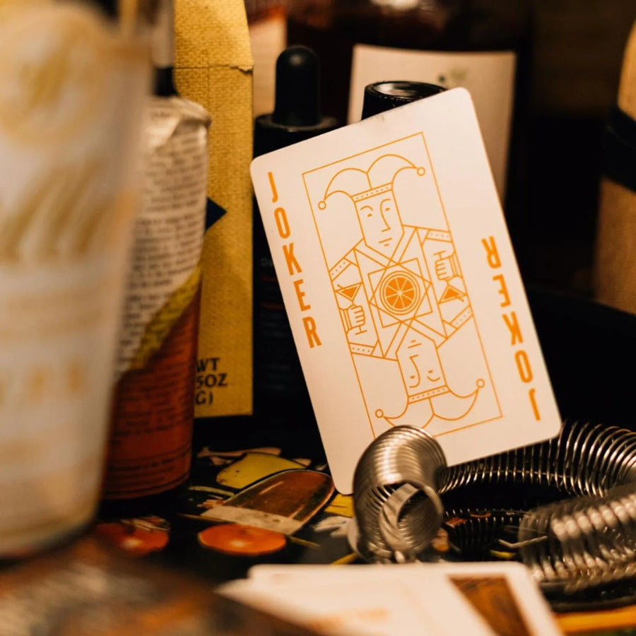 Cocktail Recipe King card shown beside bar accessories