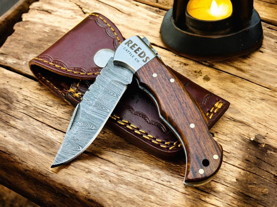 Damascus Pocket Knife – 3" Blade, Rosewood + Steel Bolsters product photo