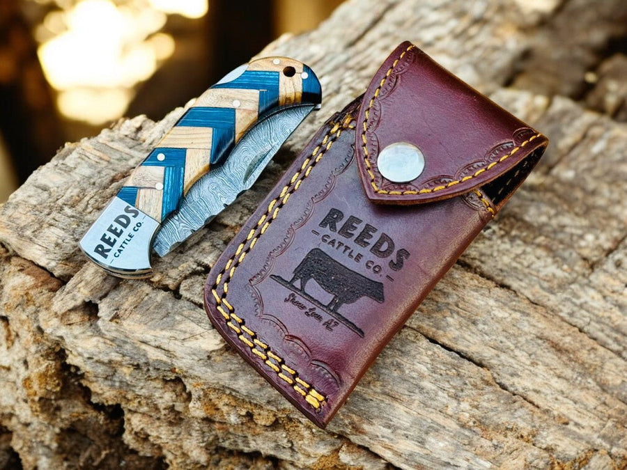 Damascus Pocket Knife – 3" Blade, Olivewood + Exotic Blue Pakka Wood product photo