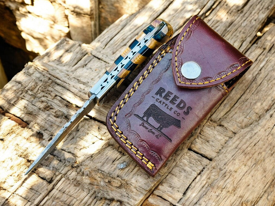 Damascus Pocket Knife – 3" Blade, Olivewood + Exotic Blue Pakka Wood product photo