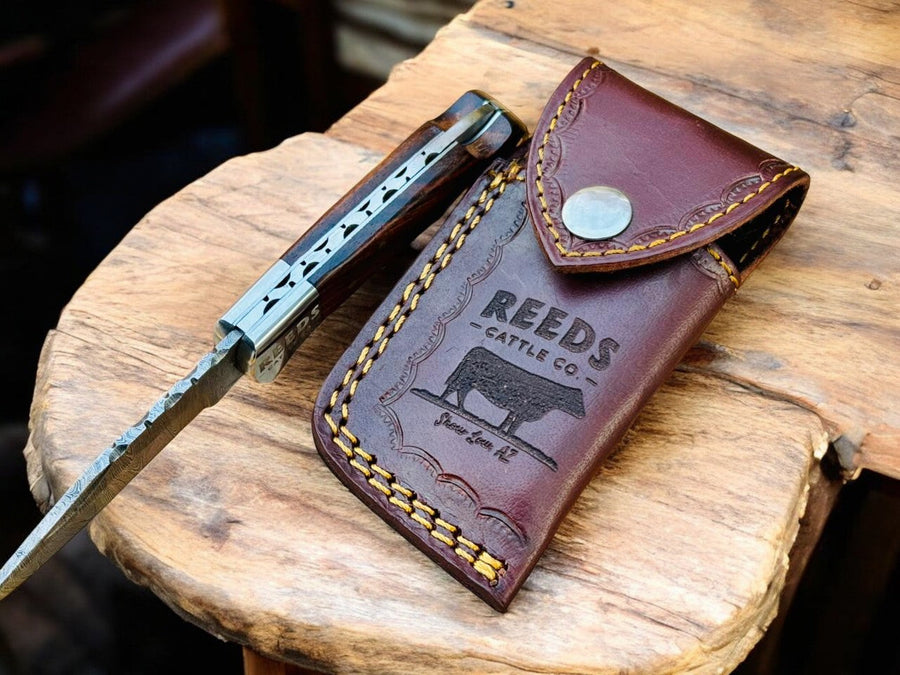 Damascus Pocket Knife – 3" Blade, Rosewood + Steel Bolsters product photo