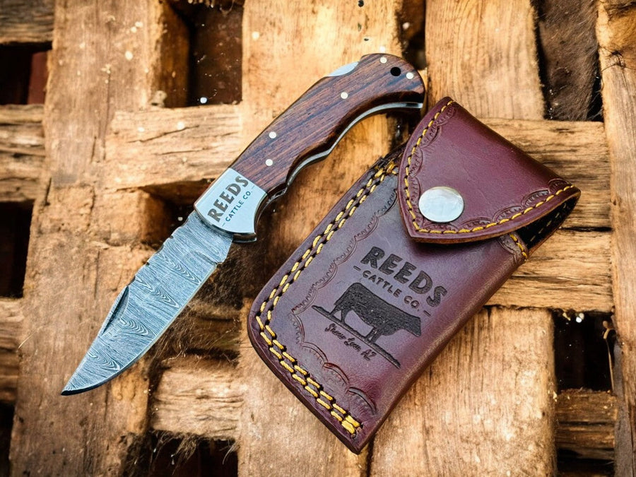 Damascus Pocket Knife – 3" Blade, Rosewood + Steel Bolsters product photo
