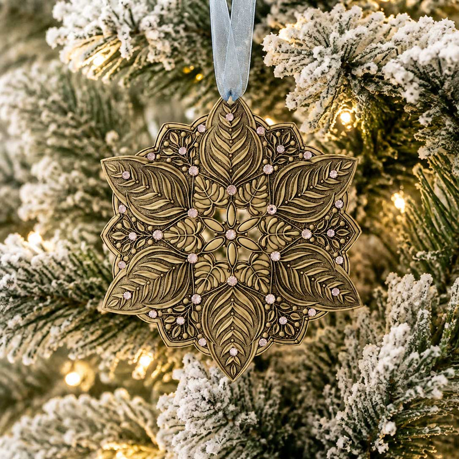 Styled display featuring Snow Crystal Winter Greens Ornament