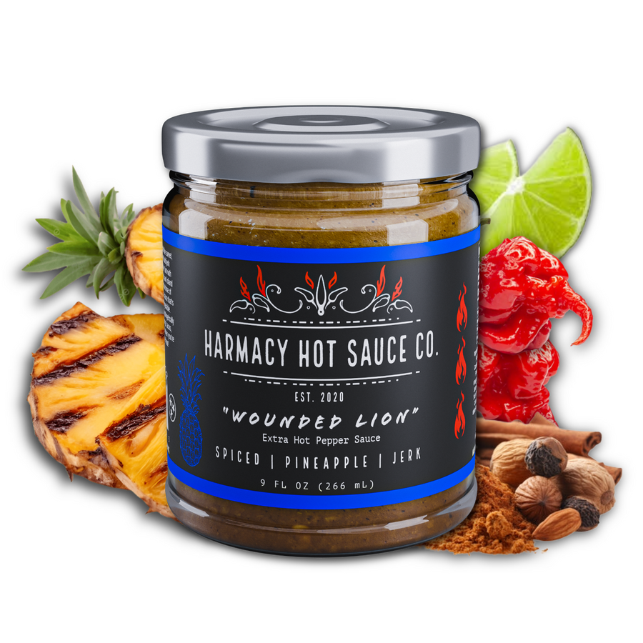 Wounded Lion - Extra Hot Pineapple Jerk 9 oz Hot Sauce — product photograph 1 of 2