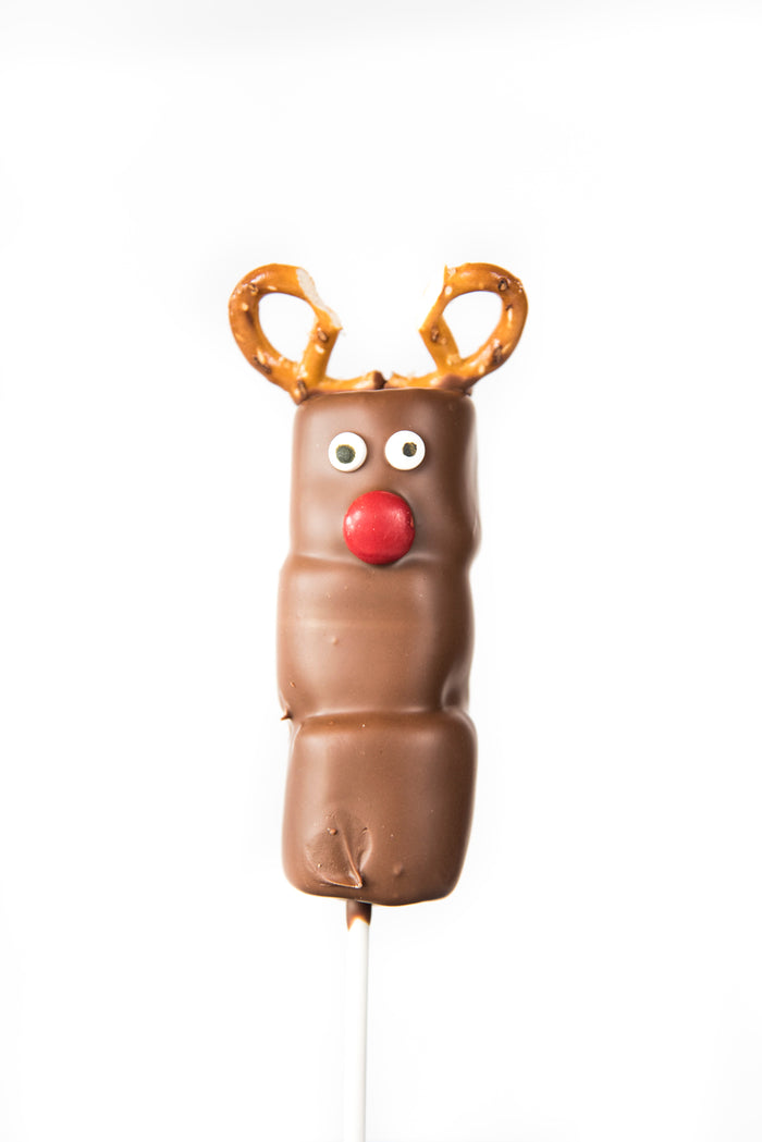 Triple milk chocolate marshmallow pop decorated as a red-nosed reindeer with pretzel antlers