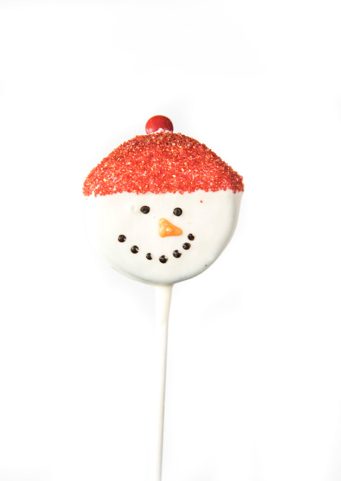 White chocolate sandwich-cookie snowman pop with a red hat