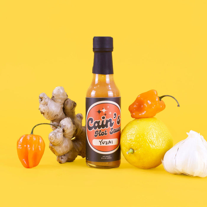 Yuzu ginger and habanero hot sauce bottle with product ingredient information