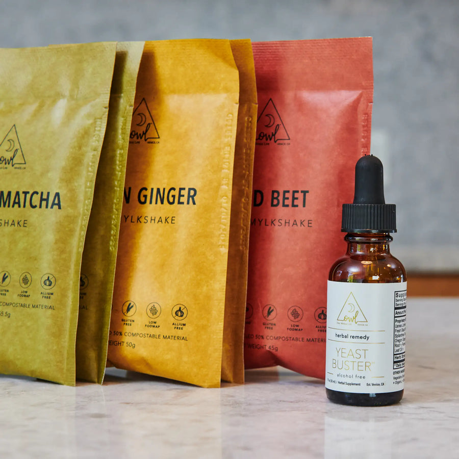Magic Matcha, Golden Ginger and Bold Beet packets beside a dropper bottle
